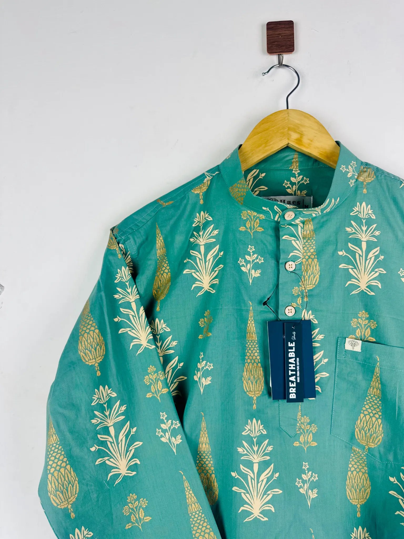 pista green motifs short kurta