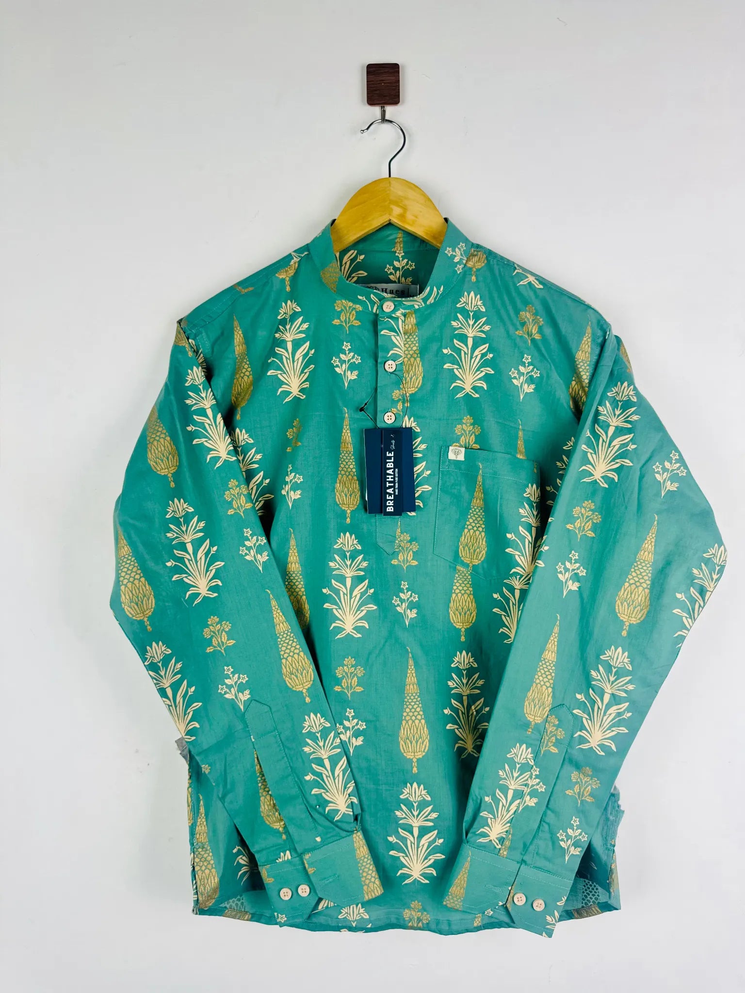 pista green motifs short kurta