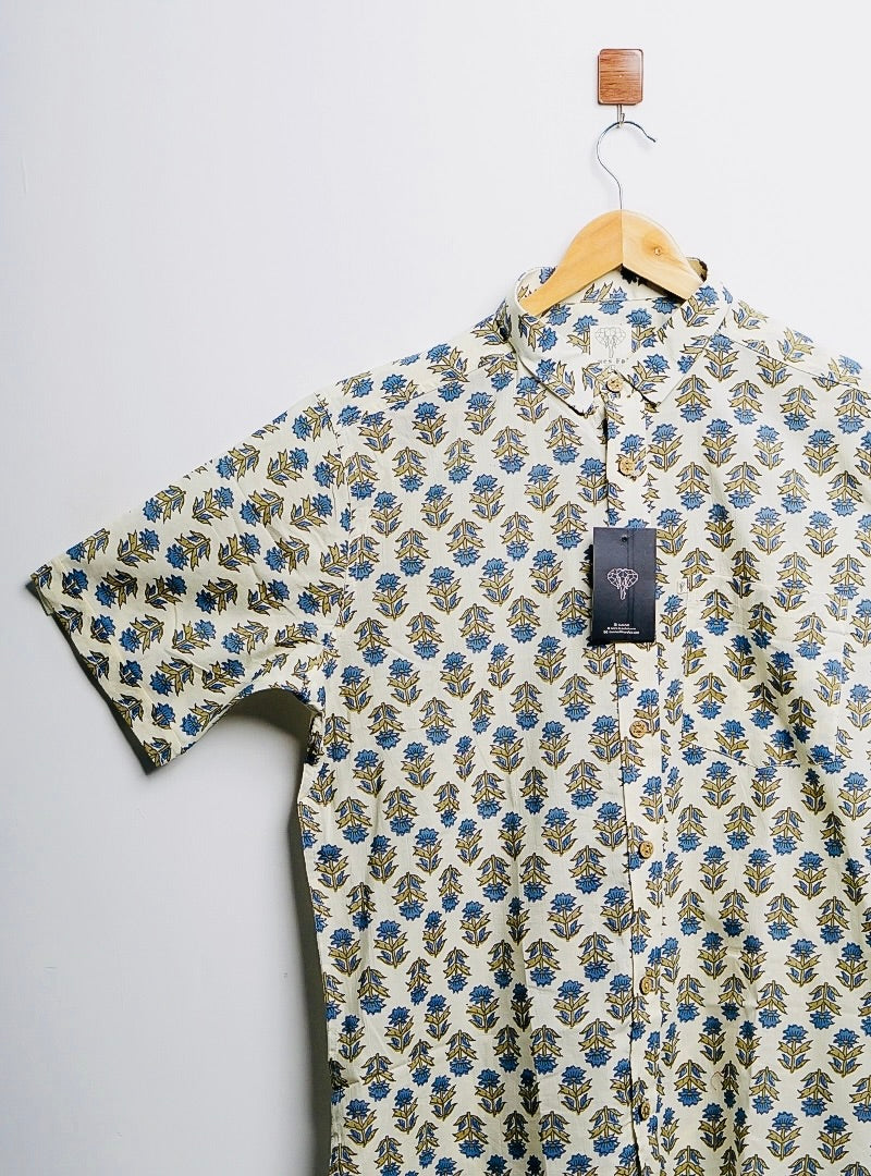 cream-blue motifs half-sleeves shirt