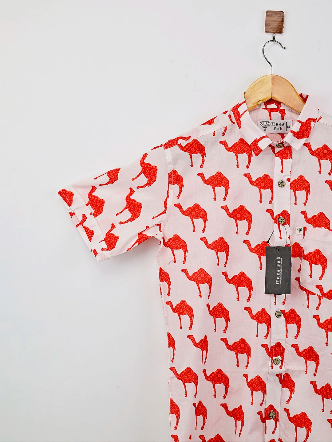 white and red camel printed half-sleeves shirt