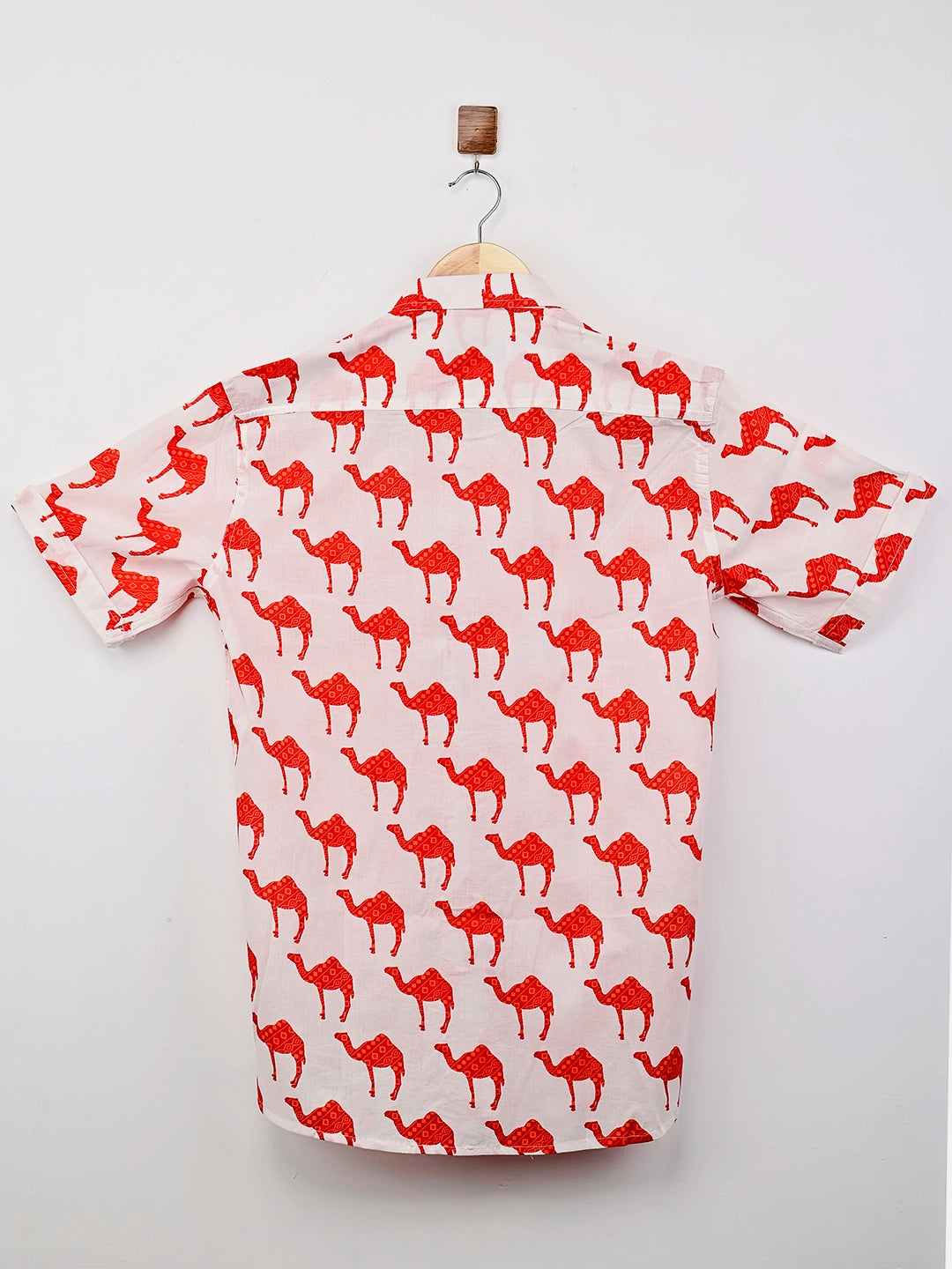 white and red camel printed half-sleeves shirt